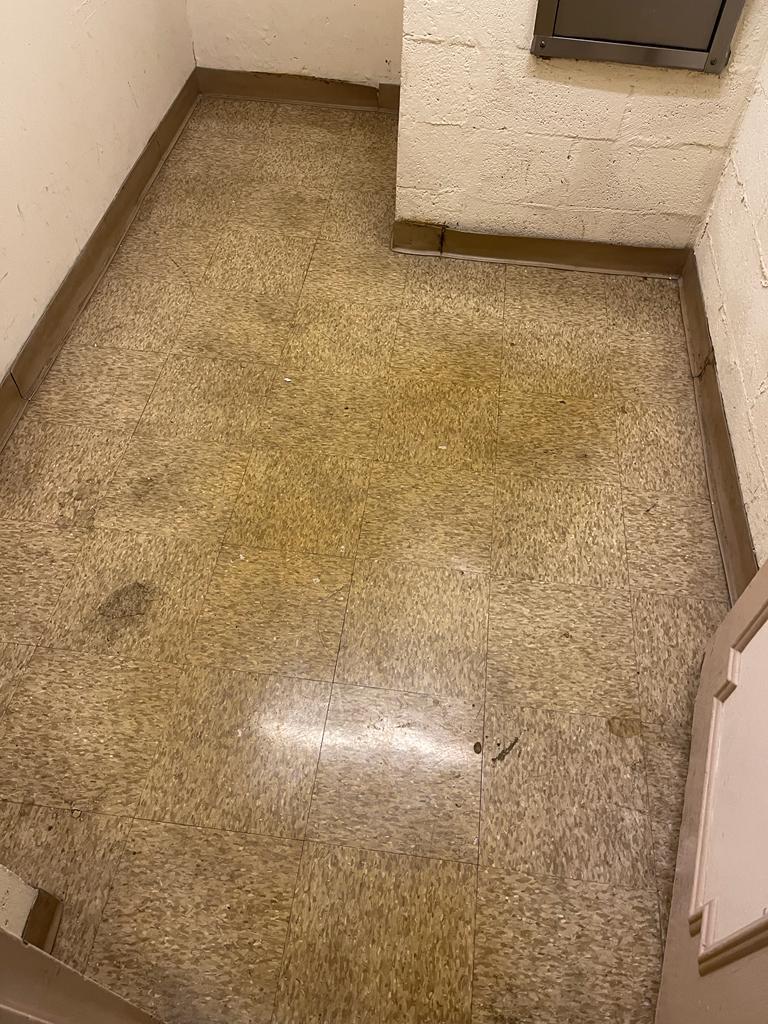 a dirty floor before Hard Surface Floor Care